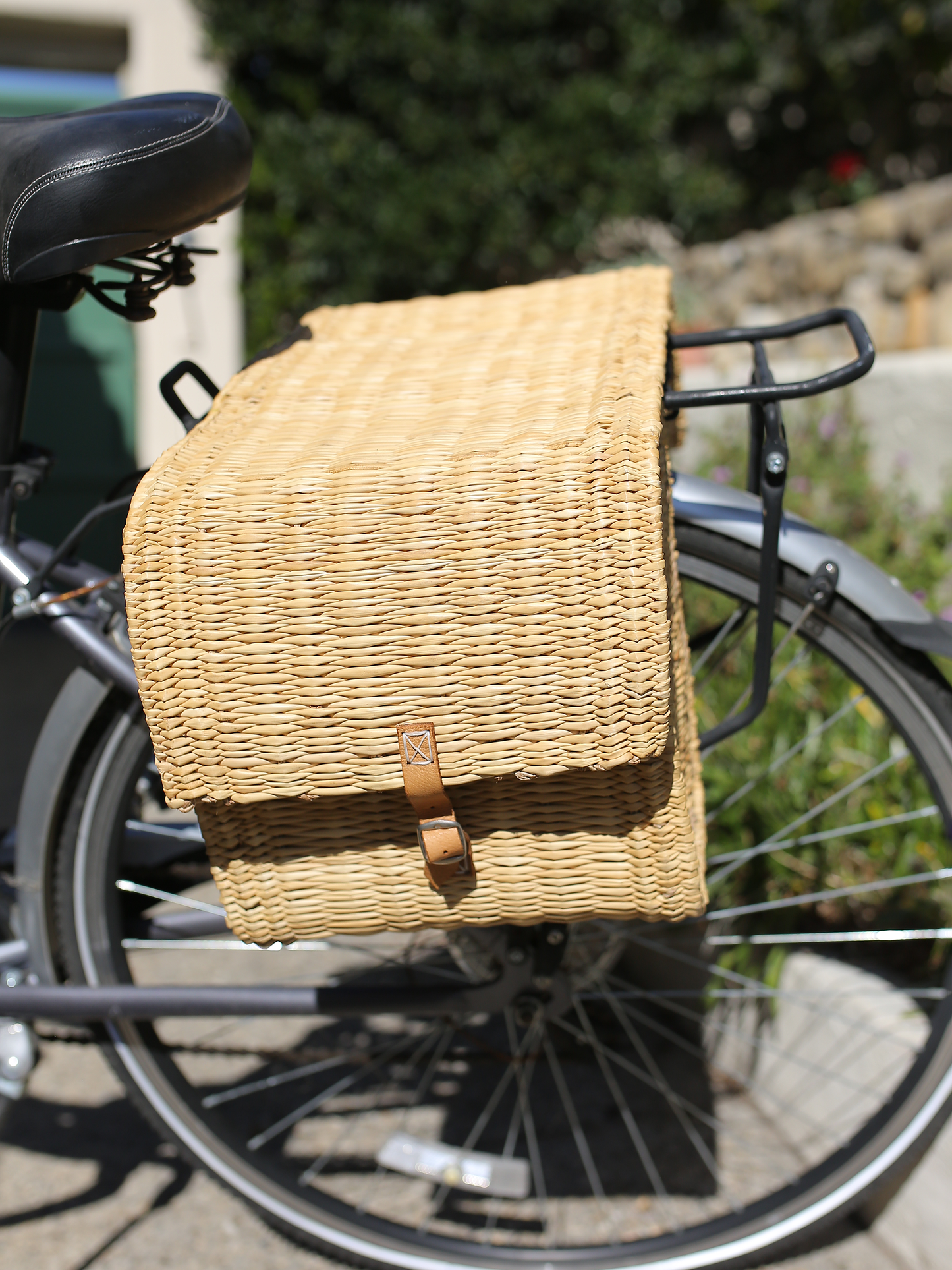 Side view of Double Panier Bicycle Basket strapped onto bicycle