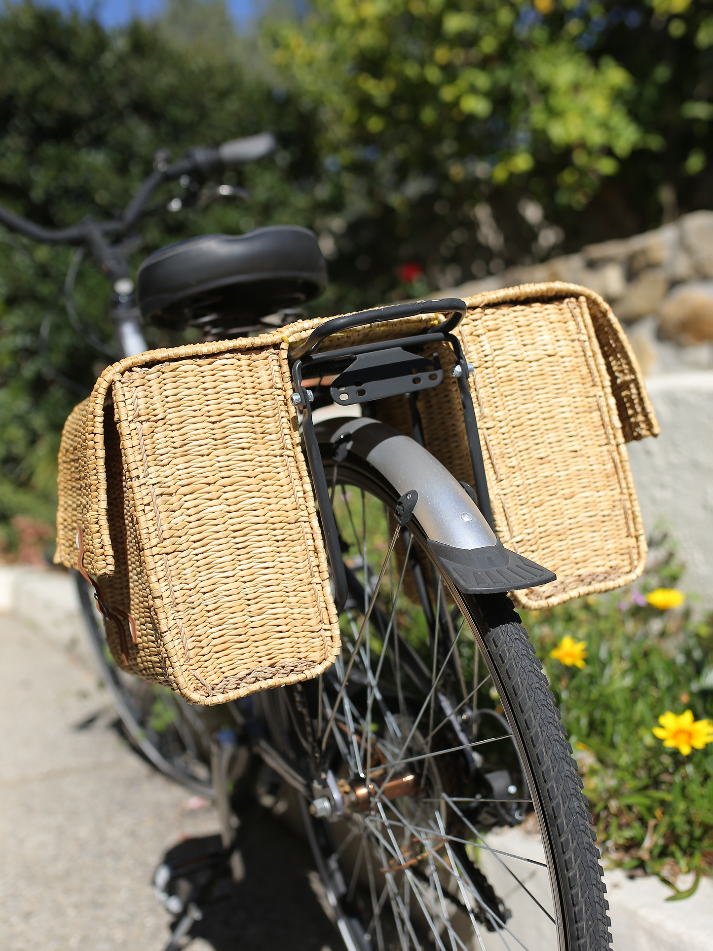 Double Panier Bicycle Basket strapped onto black bicycle