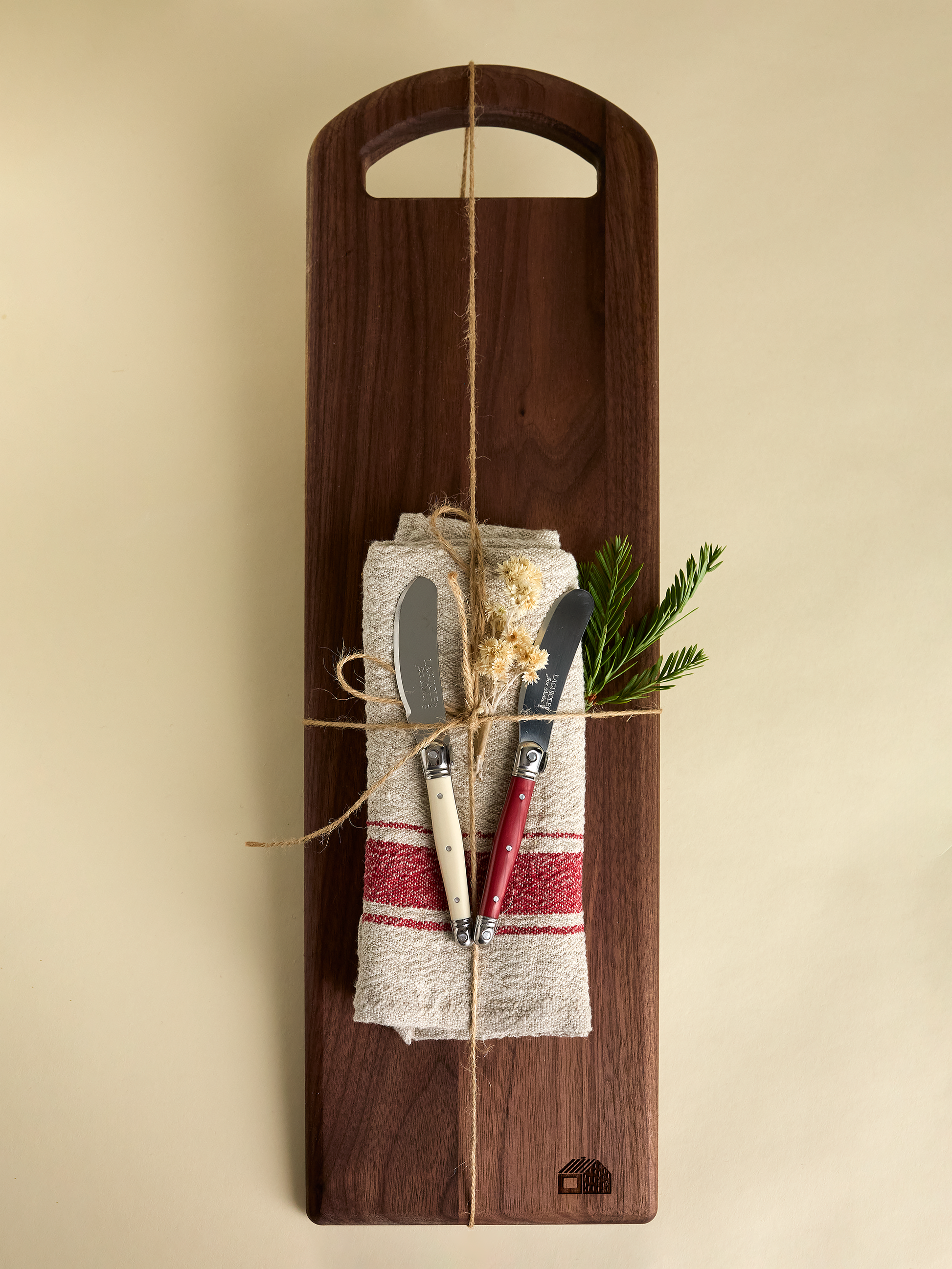 Serving accessories on top of domecíl Walnut Cutting Board