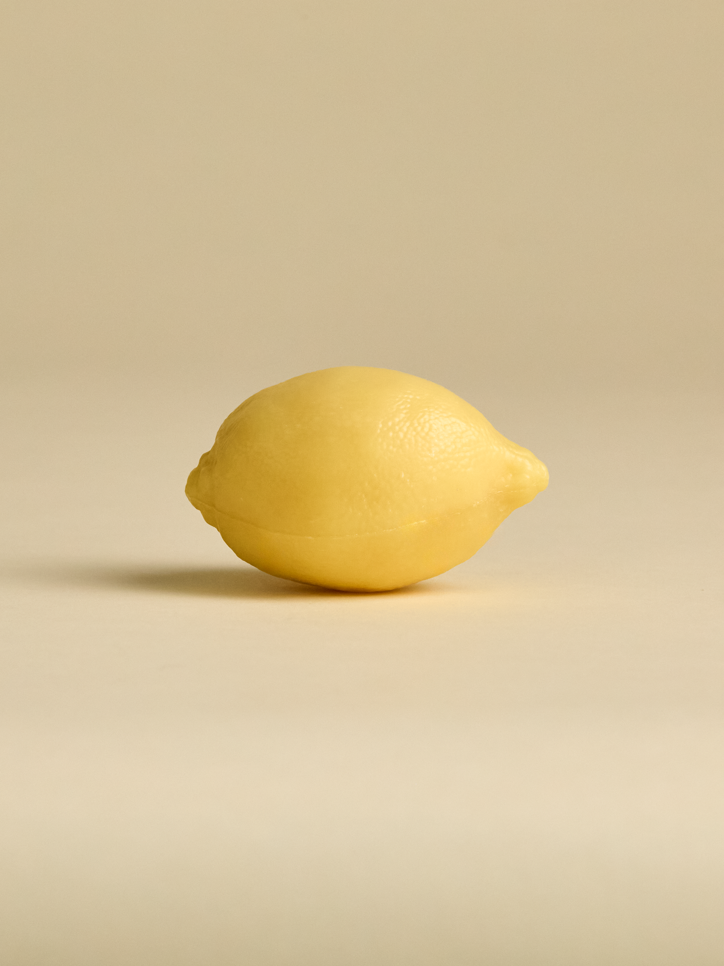 Side view of French Lemon Soap on light background