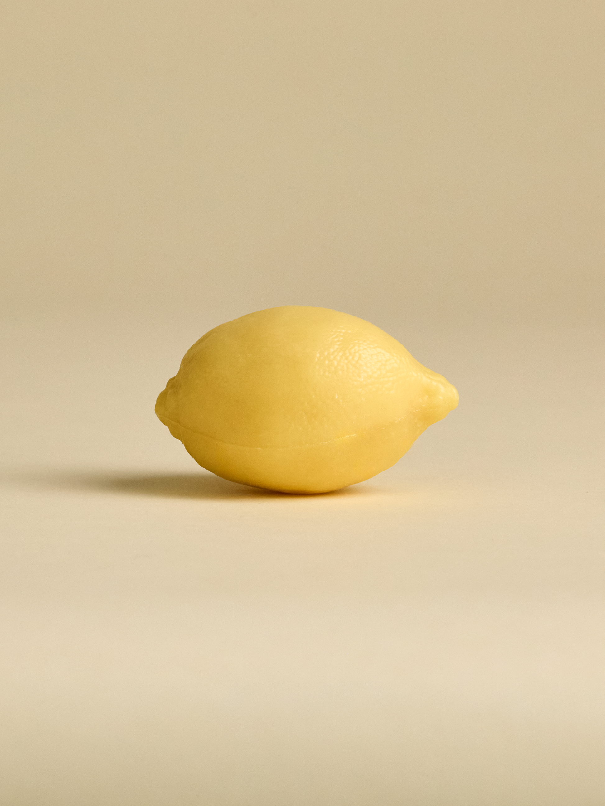 Side view of French Lemon Soap on light background