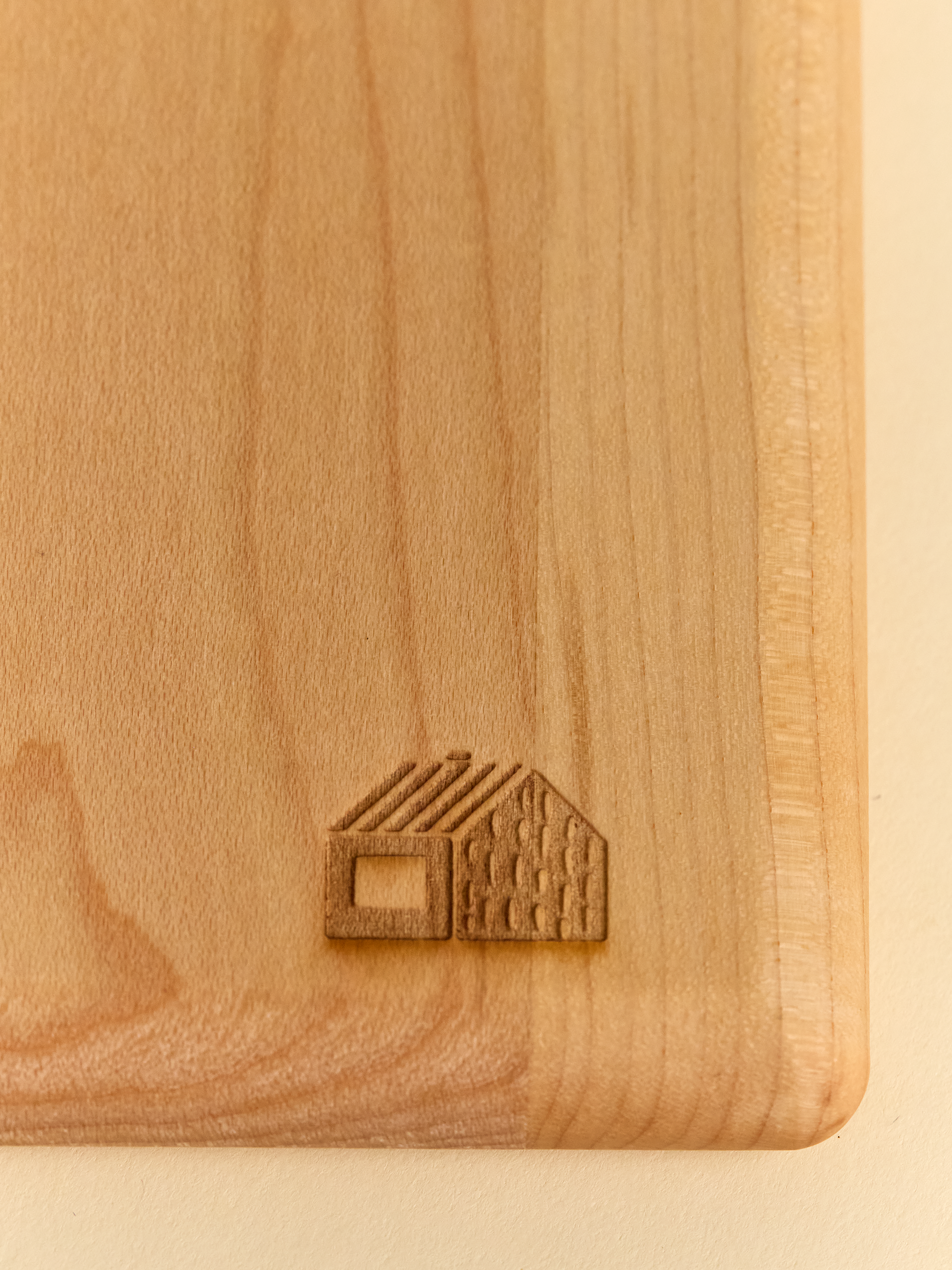Close up view of Domecil logo on Maple Cutting Board