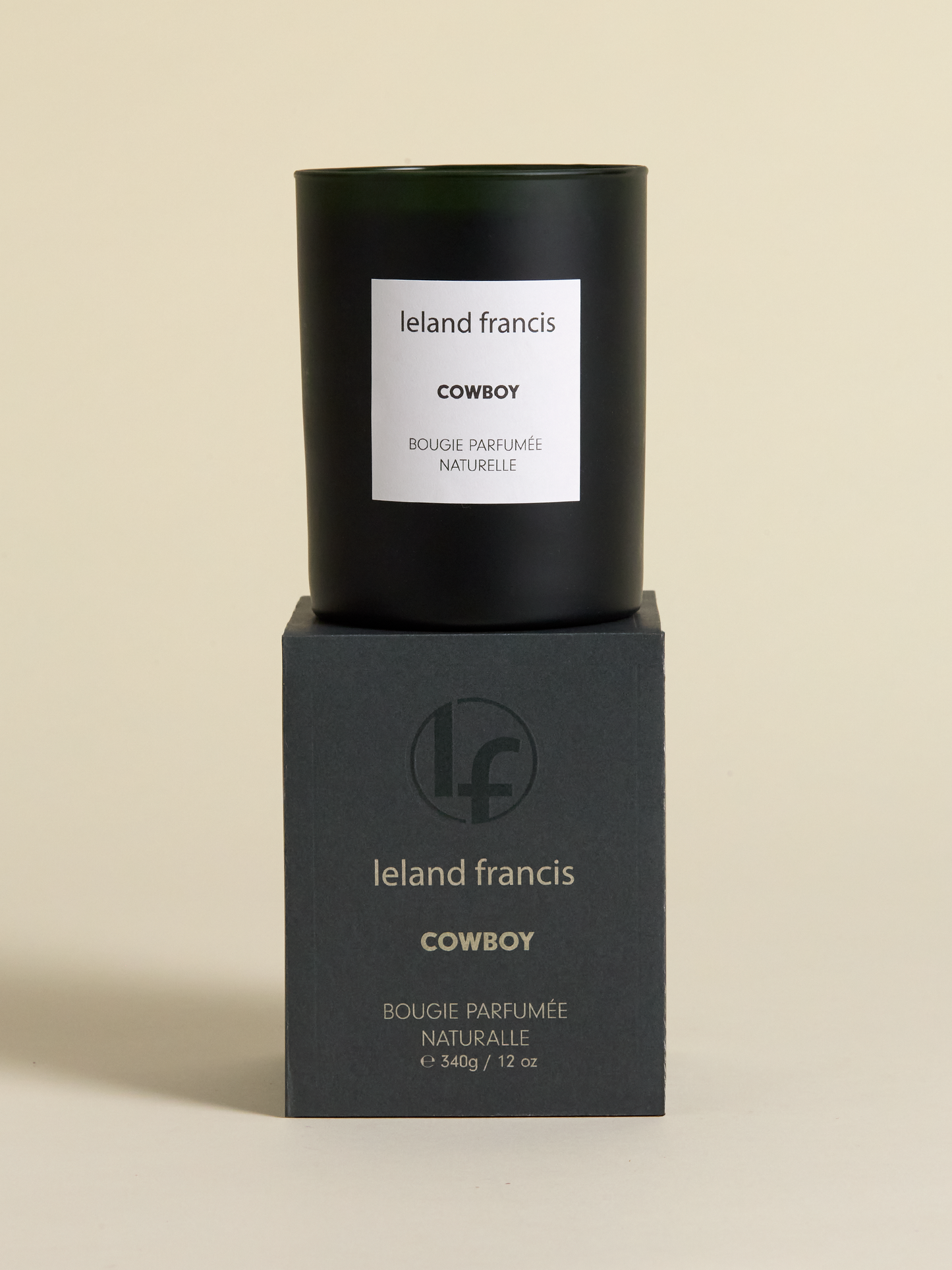 Leland Francis cowboy candle pictured on top of candle box