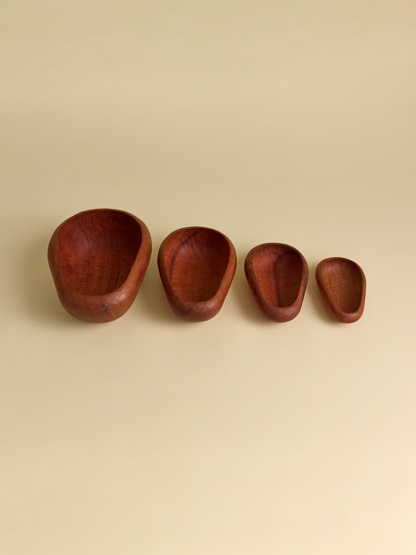 Side by side view of Hand Carved Rauli Nesting Bowls