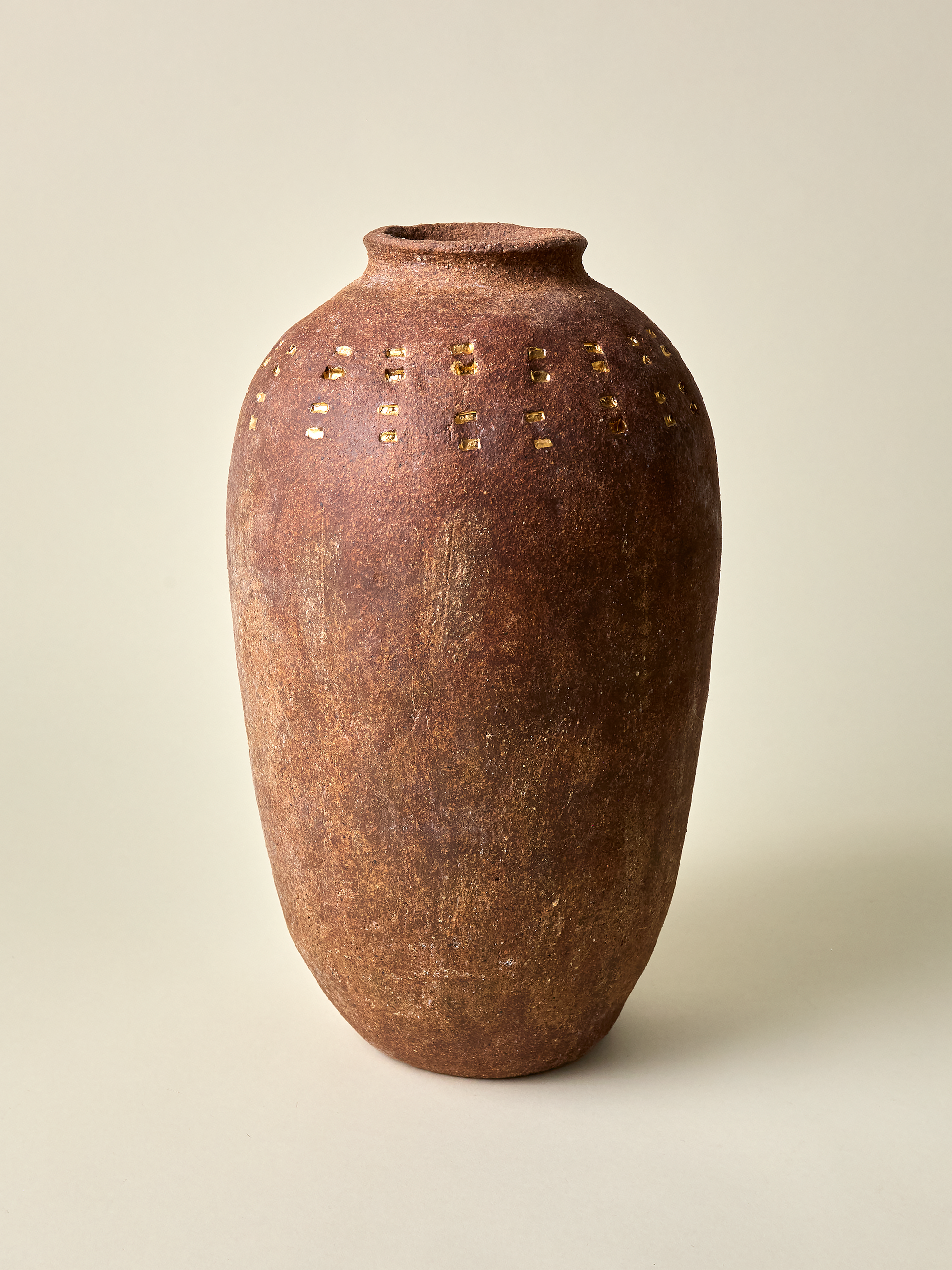 Pascale Vaquette full perspective of burnt sienna vase with gold markings