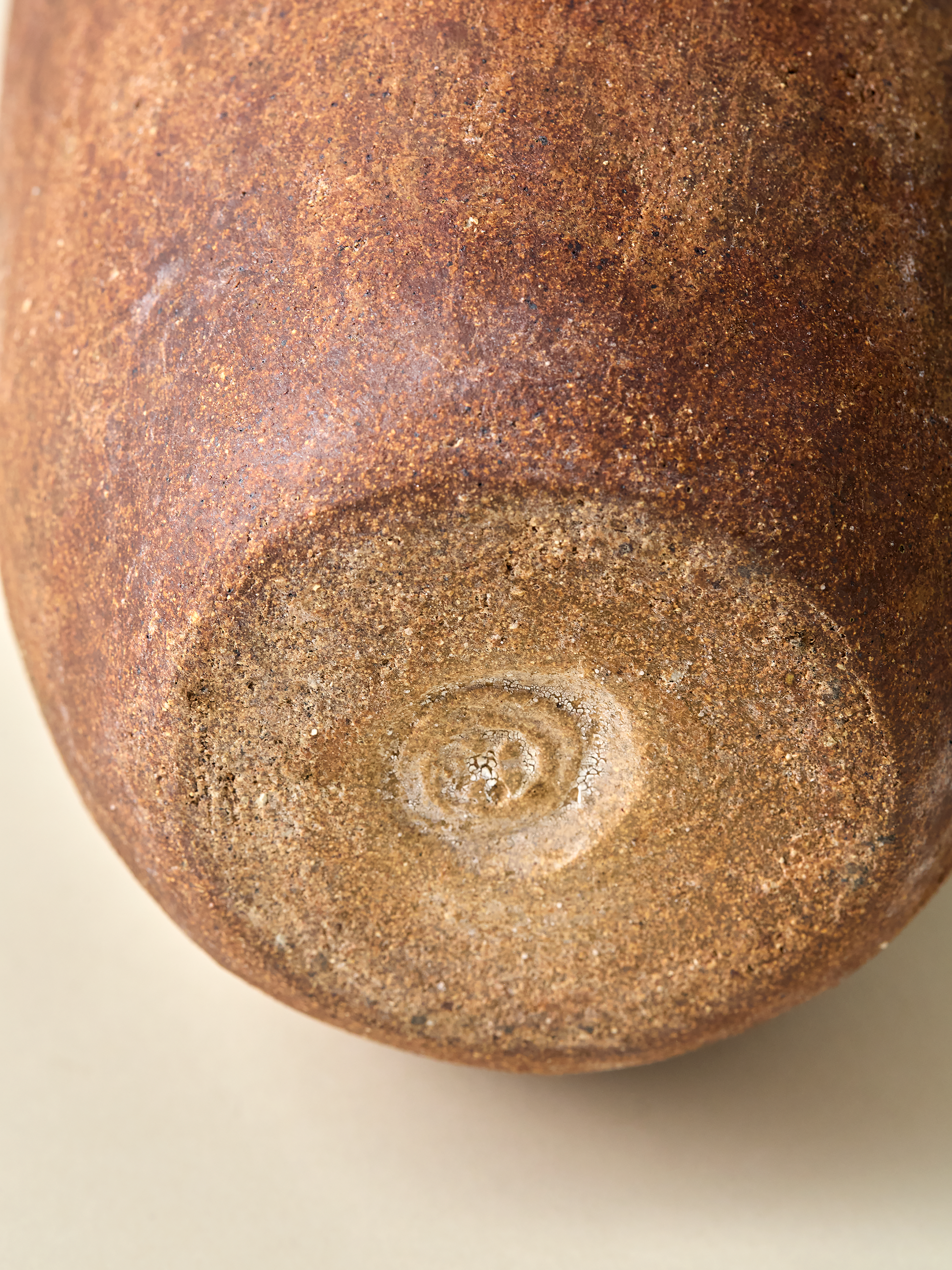 Bottom of Pascale Vaquette burnt sienna vase with artist stamp