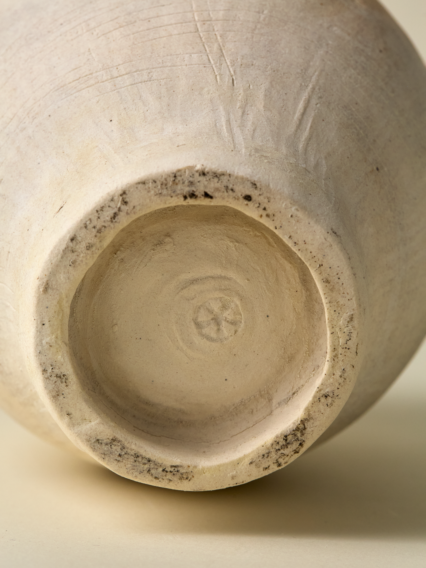 Pascale Vaquette view of unglazed ceramic vessel bottom with artist stamp