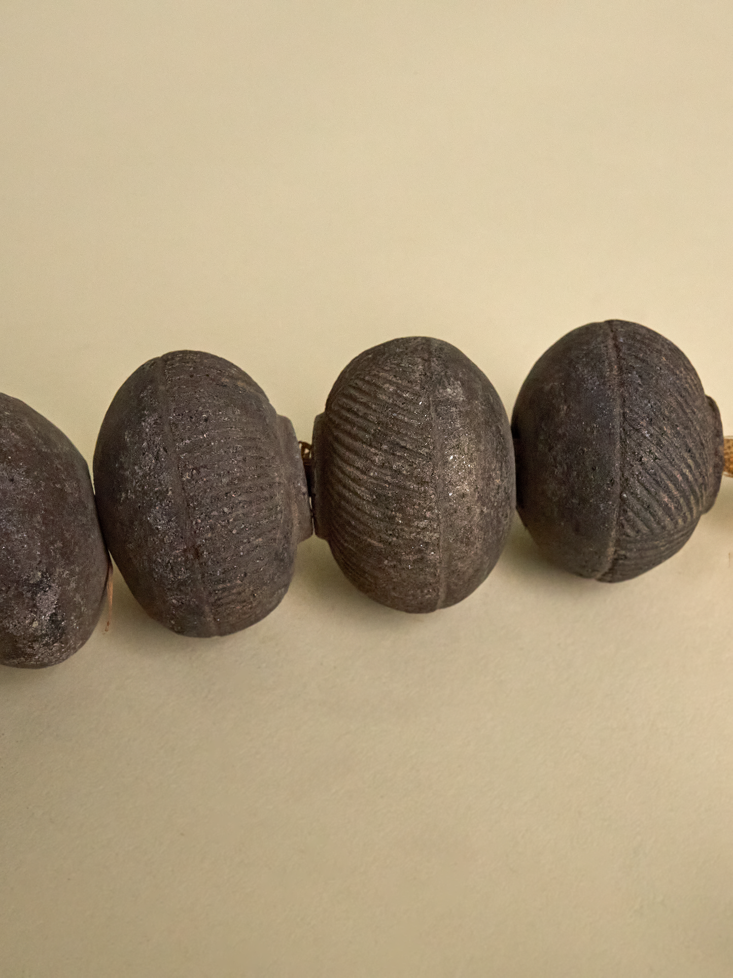 Other detailed view of clay beads on light background