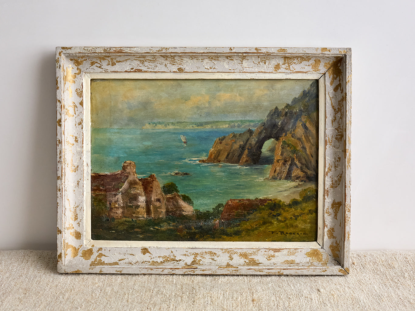 Vintage French Sea Arch Painting on white background with fabric underneath