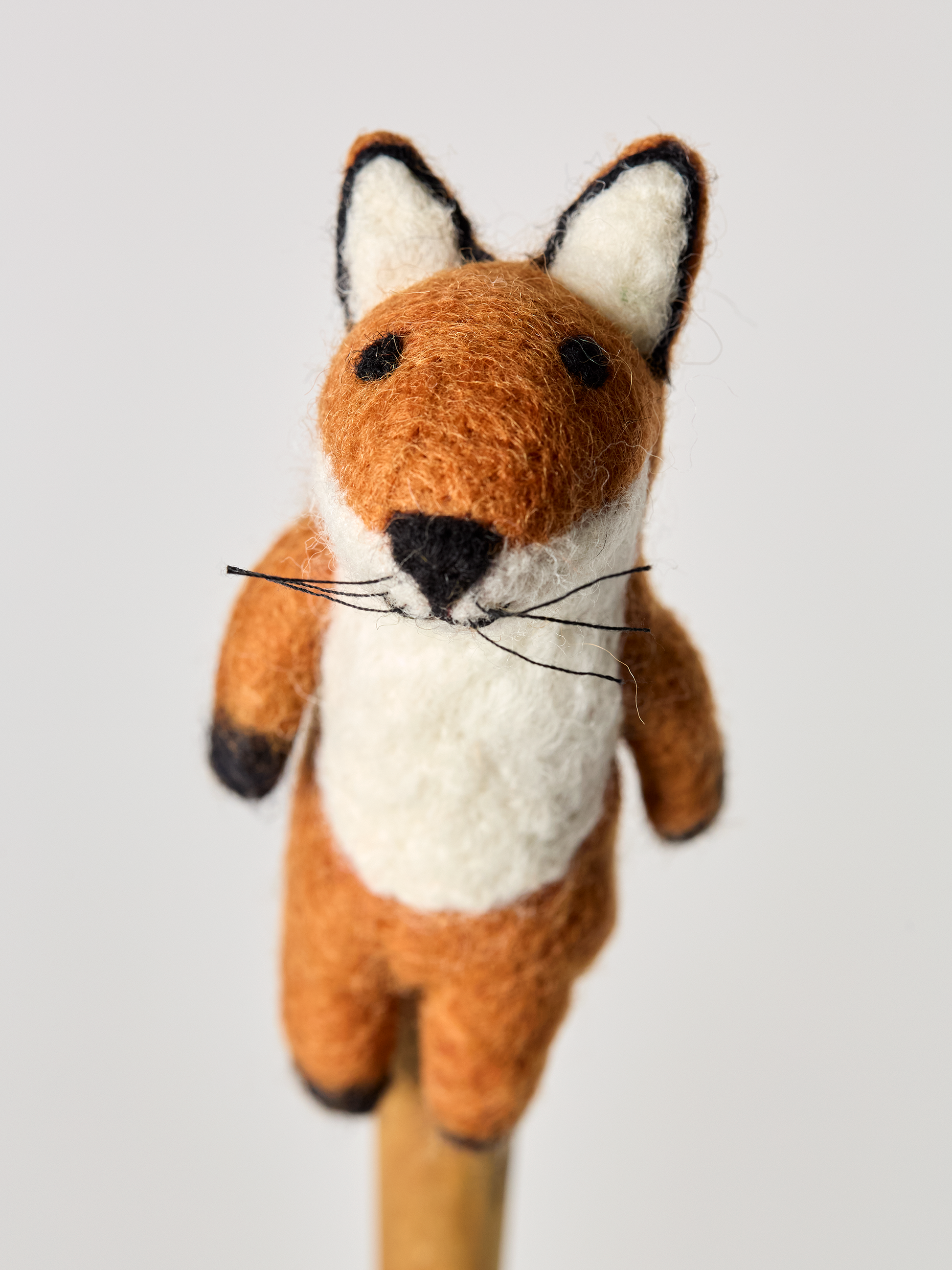 Red fox  finger puppet toy on a white background