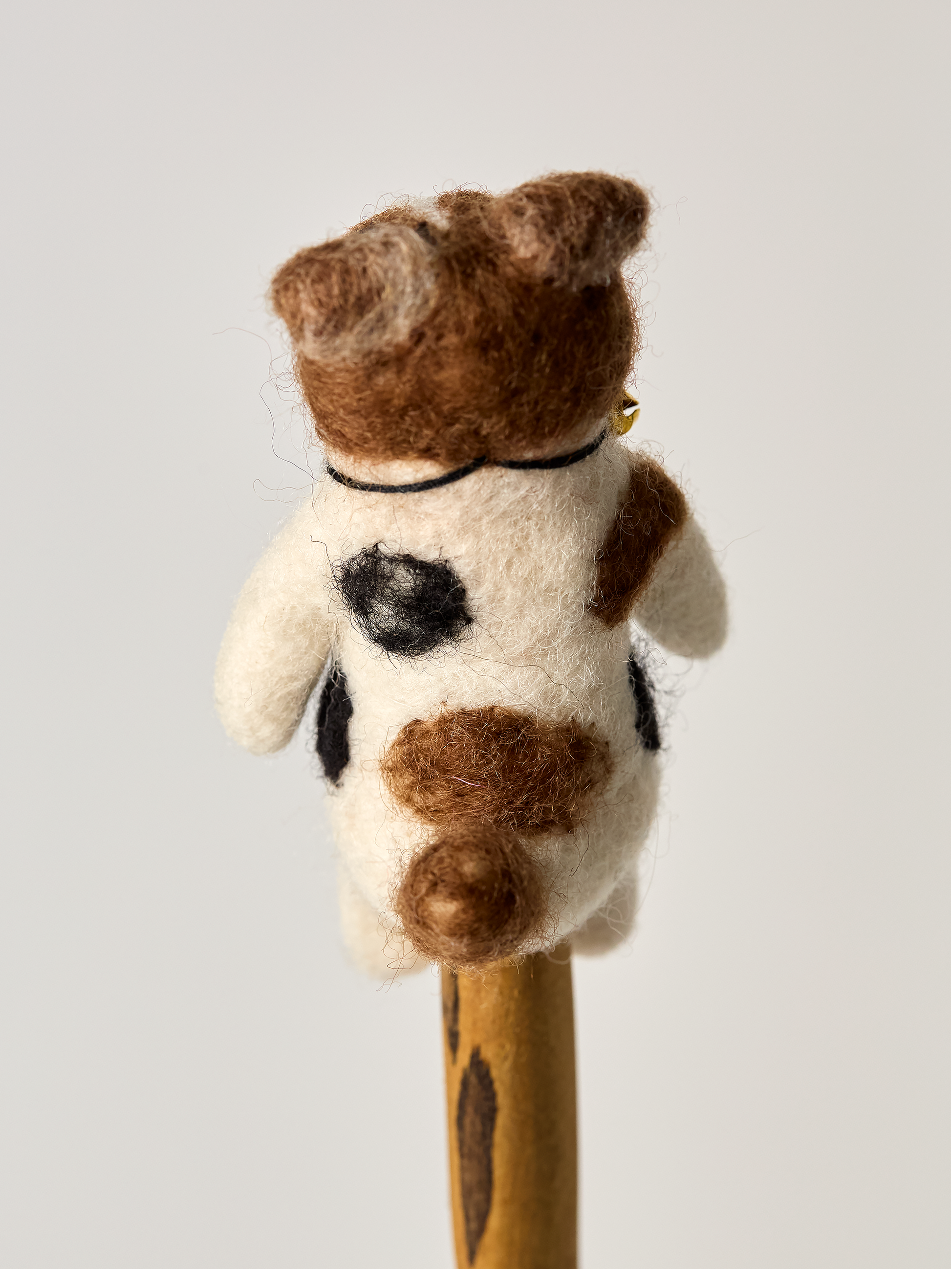 Jack Russel finger puppet dog toy  backside on a white background