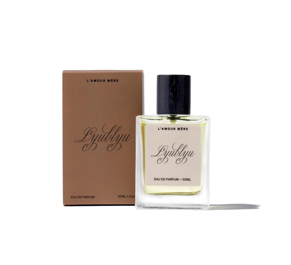 Perfume bottle and packaging with 'L'ynblny' branding on a white background