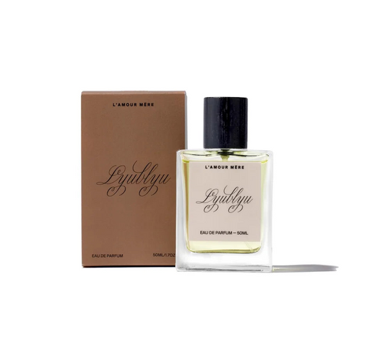 Perfume bottle and packaging with 'L'ynblny' branding on a white background