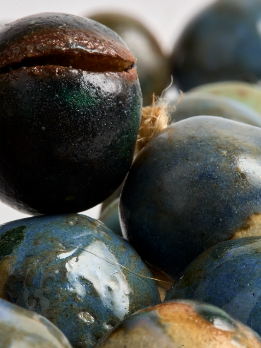 Close-up Ceramic Garland, hand crafted Blue glazed  beads