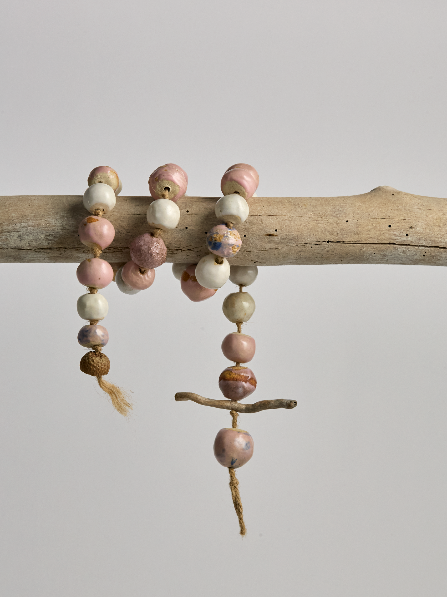 Pink & Cream Ceramic Garland handcrafted beads on a rope.