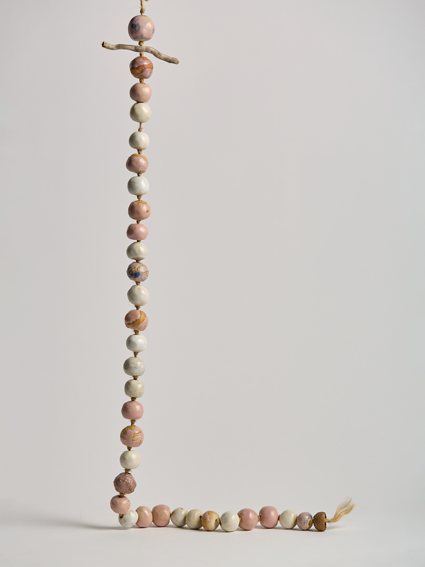 Pink & Cream Ceramic Garland handcrafted beads on a rope with twig and acorn