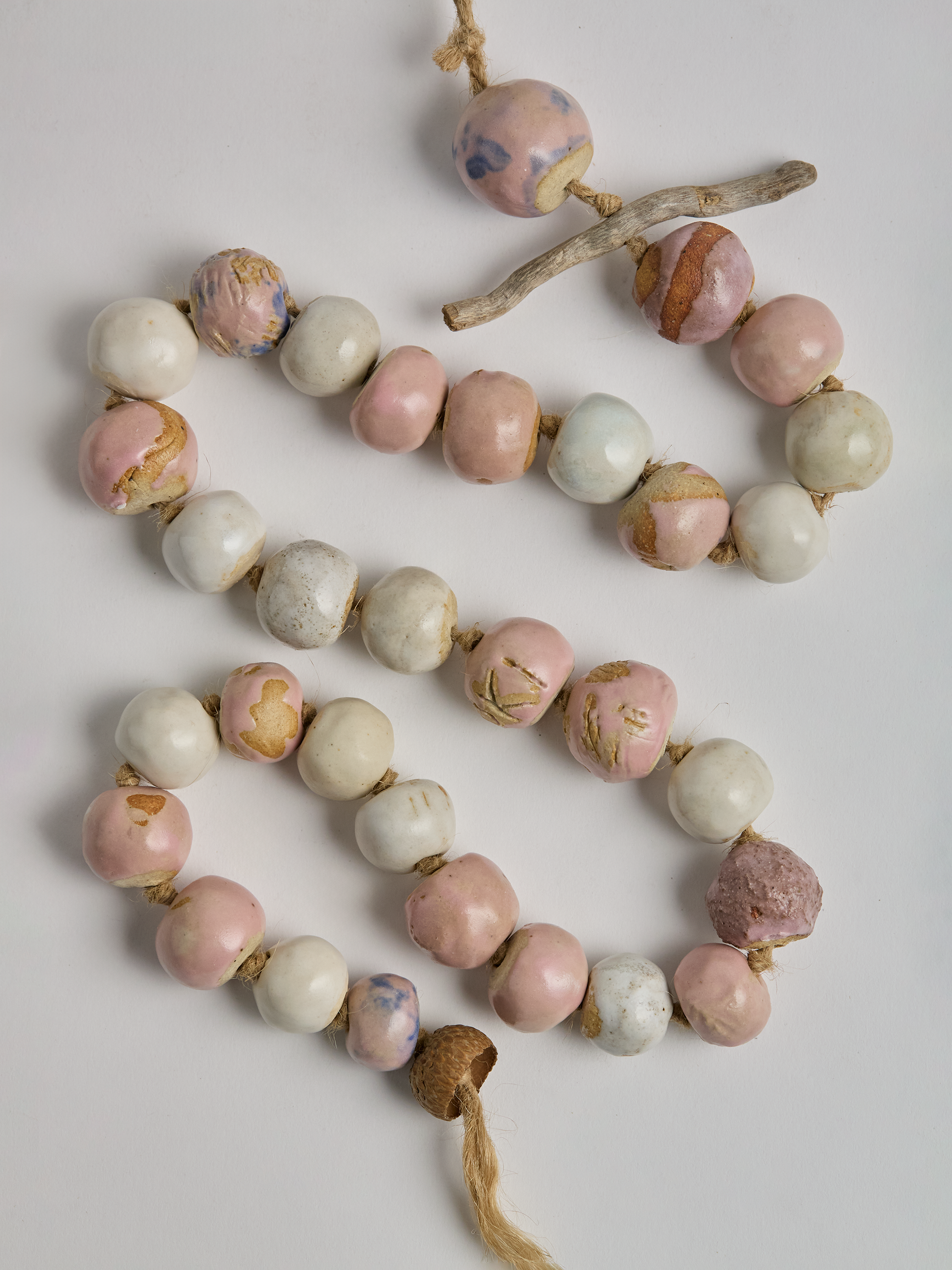 Pink & Cream Ceramic Garland handcrafted beads with twig and acorn