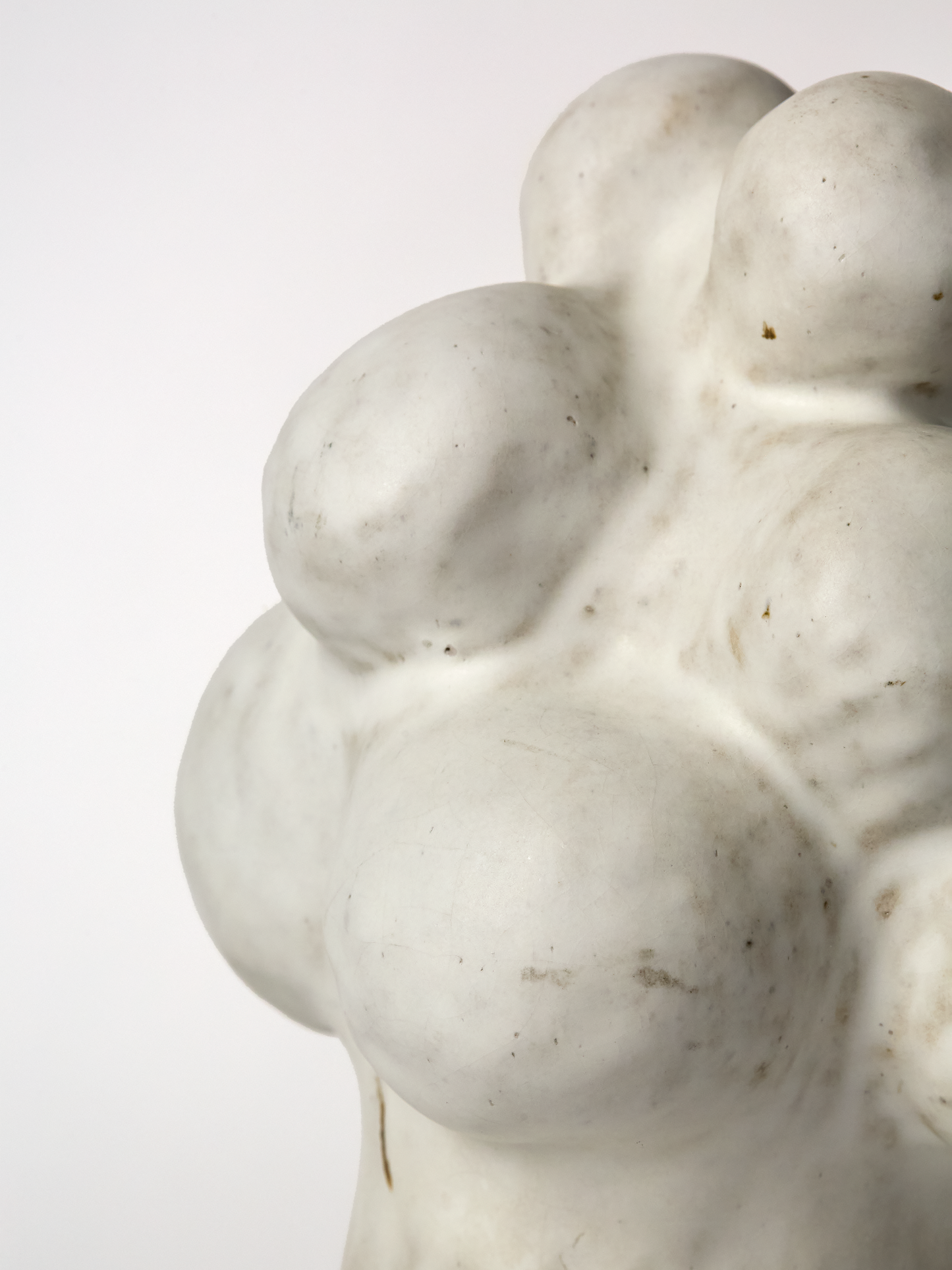 Close-up of Large Pascale Vaquette ceramic matte glaze Cloud  Sculpture on a white background.