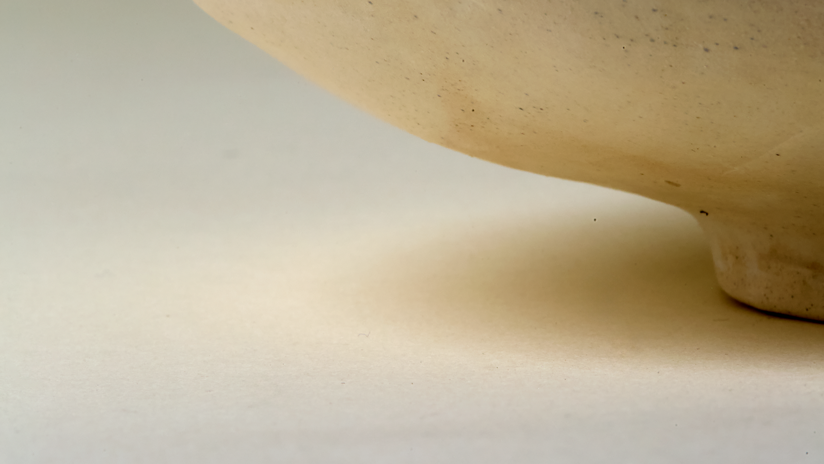 abstract close up of natural ochre ceramics in artistic setting.