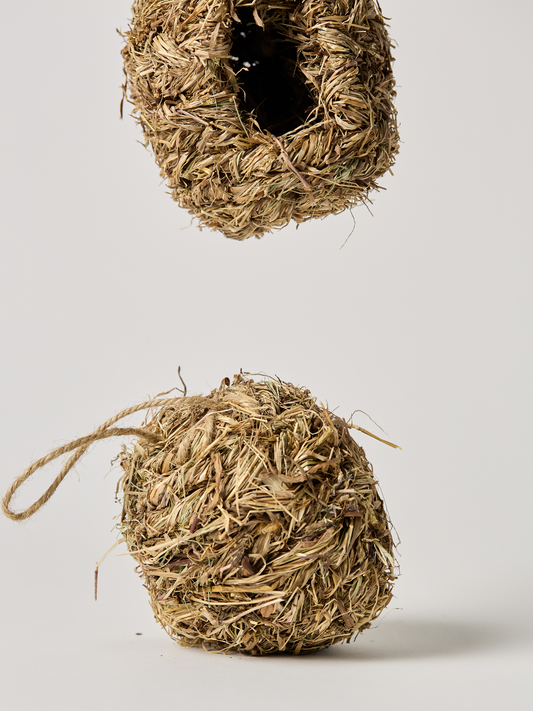 Hanging Hummingbird House made from natural grass showing two angels