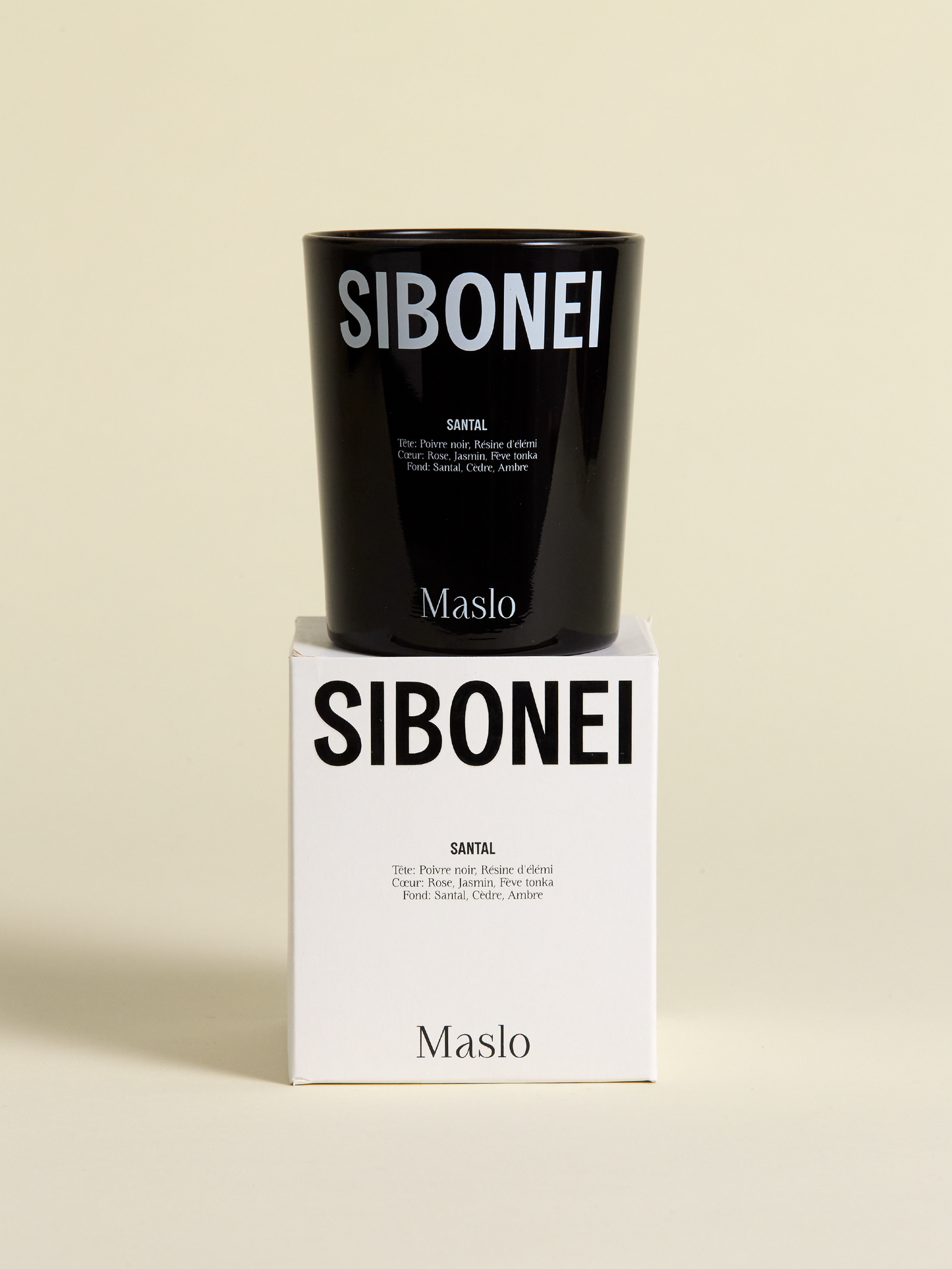 Sibonei santal "maslo" candle on top of candle box 