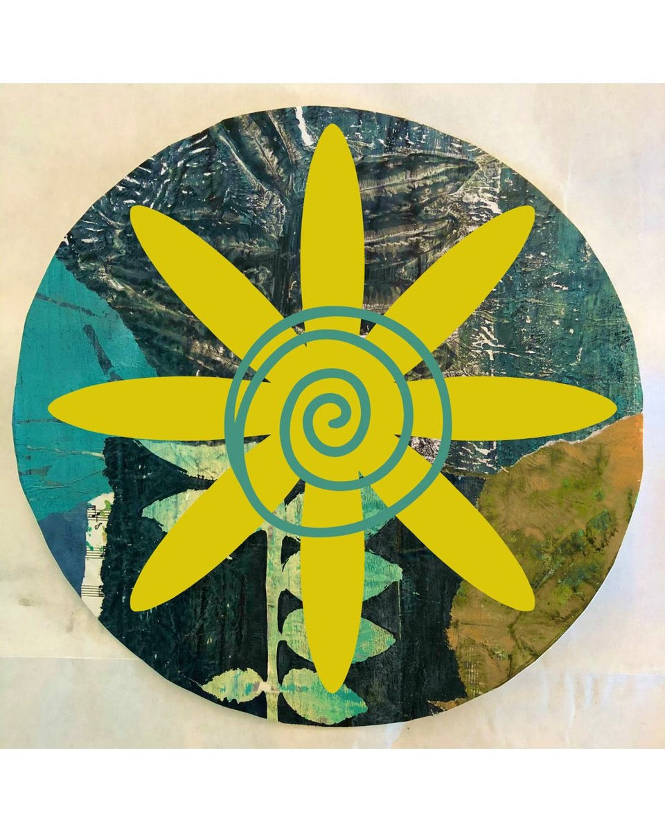 Circular mandala artwork with a yellow flower-like shape and blue center on a textured background